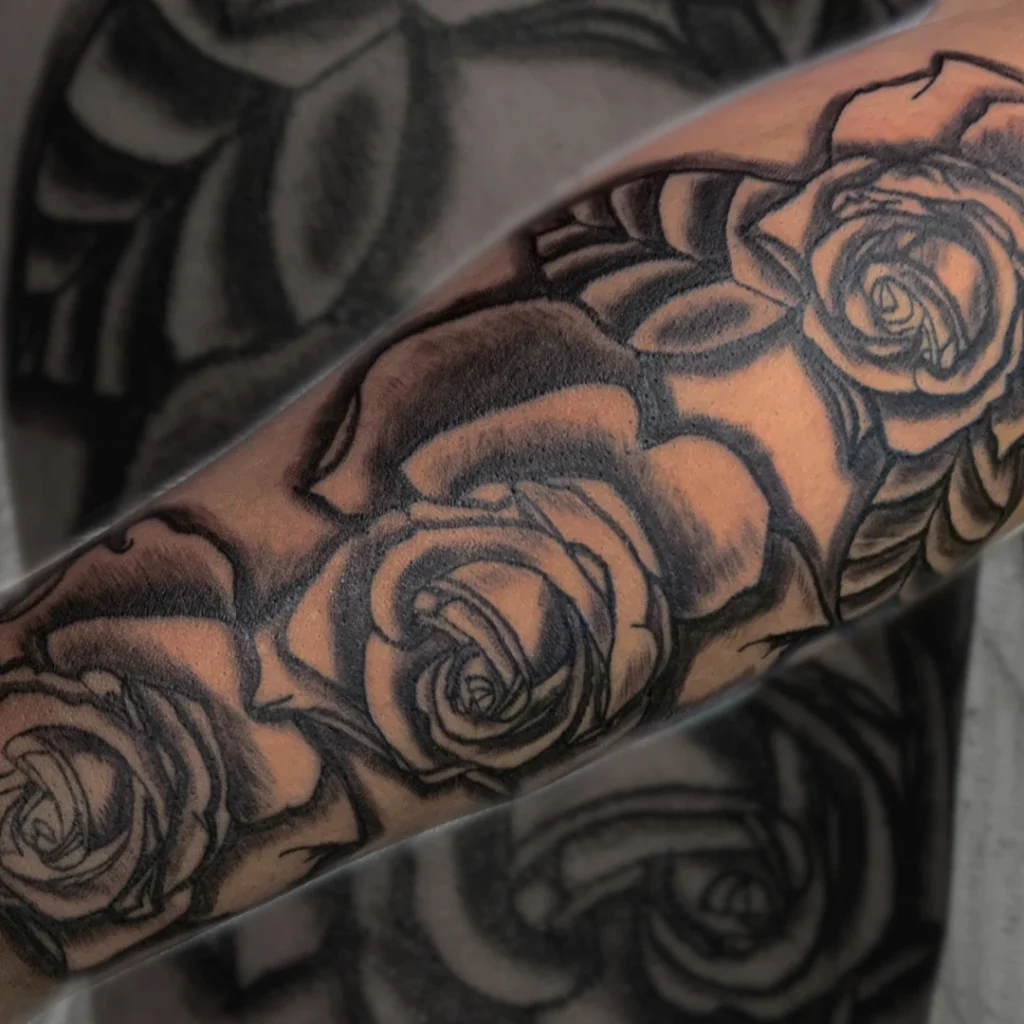 Forearm tattoo of Roses