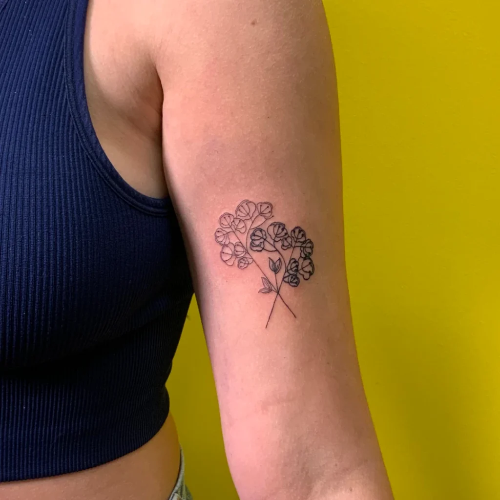 A pair of stylized baby's breath flowers.